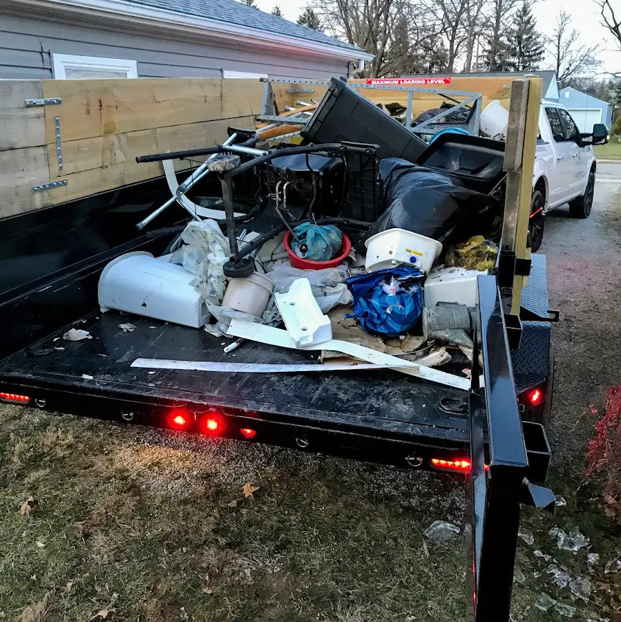 Roll-off dumpster delivered to a residential driveway in Reston